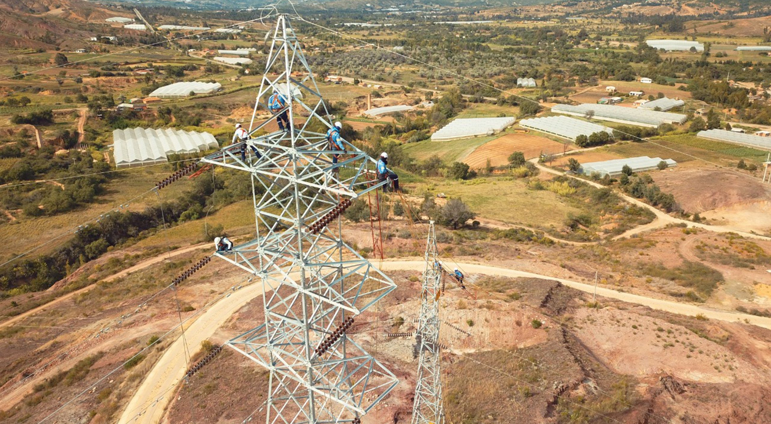 Workers on Pylons